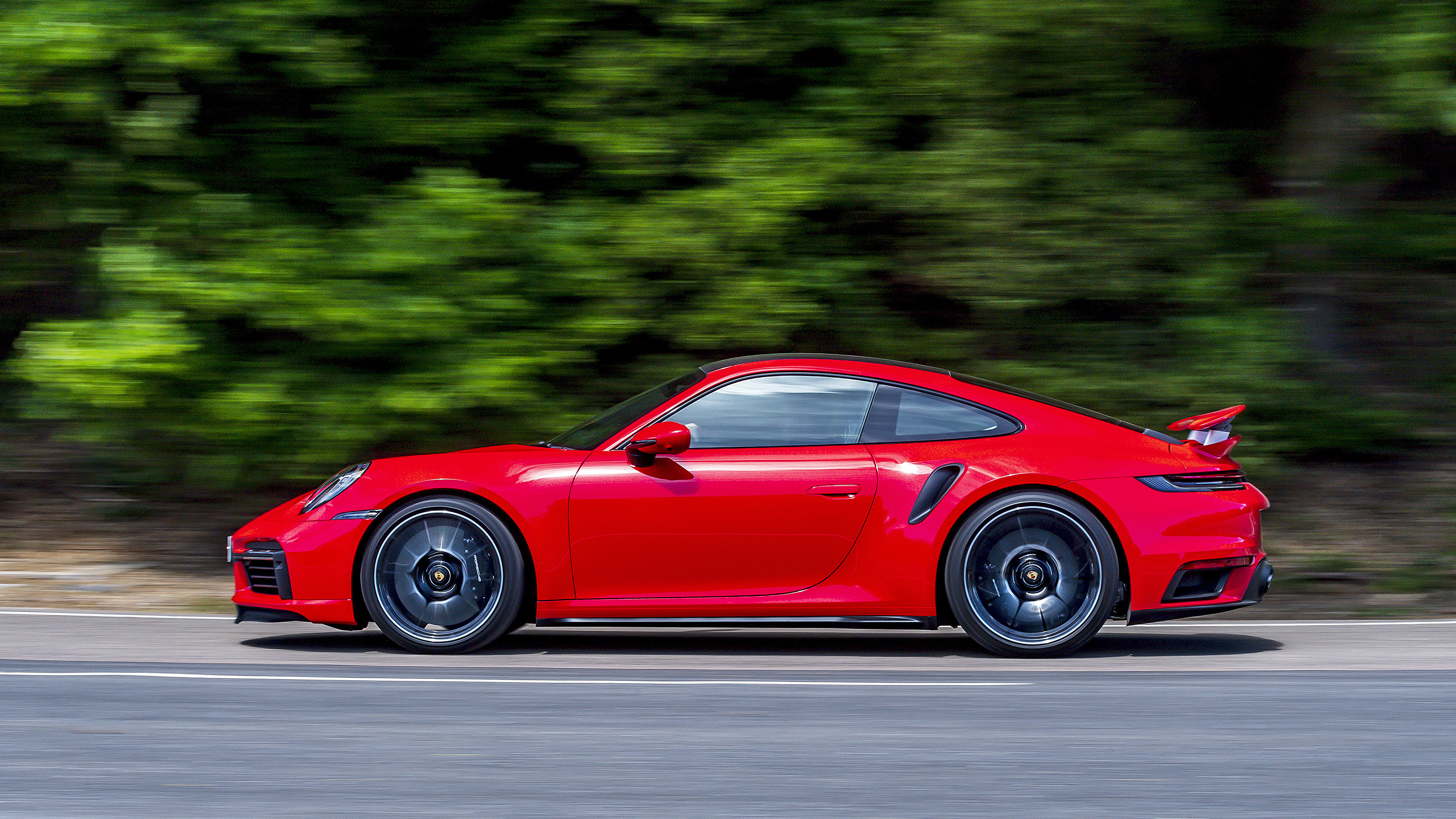 Driver perspective inside a Porsche on the road